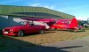 Mein Roter und Lucy - 3er BMW - E30 - 2 rote in Bienenfarm.jpg
